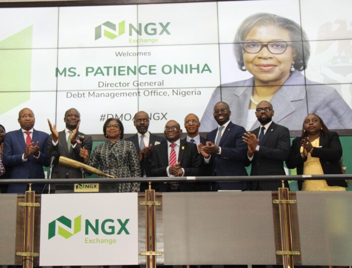 L-R: Chief Executive Officer (CEO), Central Securities Clearing System (CSCS) Plc, Mr. Haruna Jalo-Waziri; CEO, Nigerian Exchange Limited (NGX), Mr. Temi Popoola; Director General, Debt Management Office (DMO) Nigeria, Ms. Patience Oniha; CEO, Chapel Hill Denham, Mr. Bolaji Balogun; Director, Financial Markets, Central Bank of Nigeria (CBN), DJ Yanfa; Director, Market Development, DMO Mr. Monday Usiade; Chief Executive, Stanbic IBTC Capital; Mr. Funso Akere; Group Executive Director, Vetiva Capital Management Limited, Mr. Damilola Ajayi; and Divisional Head, Business Support Services, NGX, Mrs. Irene Robinson-Ayanwale; during the Closing Gong Ceremony to commemorate the listing of the Triple-Tranche USD4.00 billion Eurobonds, USD1.25 billion Eurobonds and the N250 Billion Sukuk on NGX.