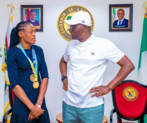 L-R: Commonwealth Gold and World Wrestling Medalist, Odunayo Adekuoroye with Lagos State Governor, Mr. Babajide Sanwo-Olu during a courtesy visit to the Governor, at Lagos House, Marina, on Tuesday, 16 August, 2022.