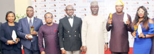Helen Ogboh, Group Head, Manufacturing, Corporate Banking Directorate, FirstBank (left); Oluwatosin Adewuyi, Executive Director, Corporate Banking Directorate/representative of Managing Director, FirstBank (second left); Obichere Anthony, Head, Business Development/representative of Infinity Trust Mortgage Bank Plc (third left); Akin Morakinyo, Director, Membership Services Directorate/representative of Registrar, Chartered Institute of Bankers of Nigeria (middle); Prof. Ahmed Modu Kumshe, Registrar/CEO, Institute of Chartered Accountants of Nigeria (third right); Mayowa Fayiga, Divisional Head, Living Trust Mortgage Bank Plc (second right), and Adefisayo Akinsanya, Head, Marketing Communications, Accion Microfinance Bank Ltd, during the Independent Finance Award (IFA), in Lagos at the weekend.