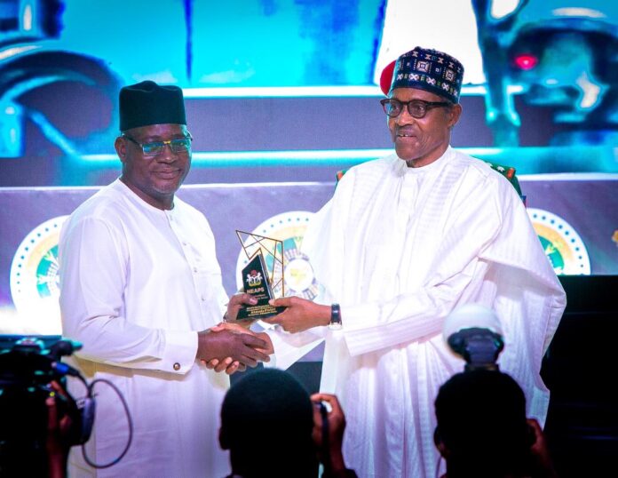 Mr. Muhammad Nami, Executive Chairman, FIRS receives Nigeria Excellence Award In Public Service for Fiscal Reforms from President Muhammadu Buhari, at the State House Conference Centre, Presidential Villa, Abuja on Friday, October 21, 2022.