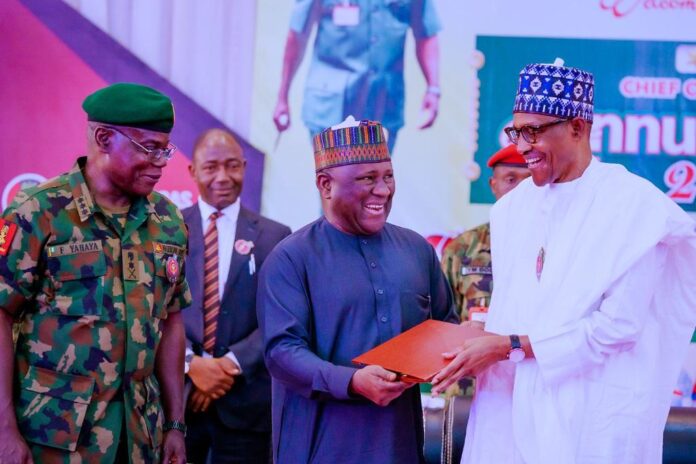 Accolades As Buhari Presents Another Award To BUA Chairman, Abdul Samad Rabiu On Behalf Of Nigerian Military