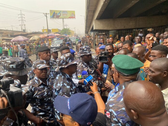 CP IDOWU OWOHUNWA VISITS MILE 12 AND OTHER TROUBLE SPOTS