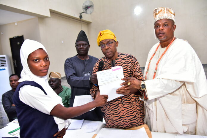 DANGOTE GRANITE MINES OFFERS SCHOLARSHIPS TO HOST COMMUNITIES STUDENTS …Promises automatic employment for exemplary ones It was an atmosphere of excitement at the weekend as Dangote Granite Mines, Ijebu Igbo, a subsidiary of Dangote Group, awarded multi-million Naira scholarships to 60 host communities’ students in various schools in the country as part of its Corporate Social Responsibility (CSR) to foster educational development in its host communities. The company also promised the beneficiaries automatic employment should they excel in their studies. The management of the Company said the scholarship was in furtherance of its efforts at ensuring that its host communities are not left behind in terms of development especially in the area of education and infrastructure noting that education is one of the key areas of focus for development. Beneficiaries of the scholarship award were drawn from the five host communities to Dangote Granite Mines which includes Ajebandele; Olorunmodi Ademowo; Saliu Baba Risi; Idi-Omo and Ijebu-Igbo township. The scholarship covers both secondary and higher institution students. h Mr. Ebenezer Fola Ali, Director, Human Assets Management, Dangote Projects who handed over the cheques to each of the awardees explained that the scholarship was meant to help the parents of the beneficiaries to lessen the burden the education of their children placed on them. He stated that the scholarship award was part of the agreement reached with the leadership of the host communities during the signing of the Community Development Agreement (CDA) and urged the beneficiaries to face their education as they will be given automatic employment f they do well academically. While also presenting the signed CDA to the Ijebu Igbo monarch, the Sopenlukale of Oke Sopen, Oba Muftau Adesesan Yussuf, Mr. Ali thanked the monarch and the communities’ leaders for creating an atmosphere of peace in the area and for showing the understanding that has led to the tranquillity being enjoyed by the company and the communities. He assured the communities of the readiness of the company to do its own part of the agreement and ensure it identifies with the people at all times while also promising that the management would follow the CDA to the letter. Mr. Ali also charged the communities leaders to continue to support the management of Dangote Granite Mines by maintaining peace. In the same vein, he charged the beneficiaries of the scholarship award not to let the Company and their parents down by engaging in activities that could derail their education. He told the beneficiaries to justify their choice as recipients of the award by going ahead to excel in their different fields so as to spur on the management to do more. In his remark, the Sopenlukale, Oba Yussuf thanked the management of Dangote Group for the show of assistance to the communities pointing out that the award of the scholarship indicated that the company was community friendly and committed to giving back to the society hence “it deserves all the supports the communities can muster.” The monarch urged his people not to take the scholarship award and other projects that the Dangote management is doing for the communities for granted but should be seen as a show of love for the host communities because “let no one harbour the misconception that Dangote is doing the mining her free. Its not like that, the company is paying the government, both the state and the federal, what they are doing for us is an act of love and magnanimity.” He told the people to continue to maintain peace as it is only when there is peace that the company can help the communities more. One of the beneficiaries, Miss Aregbe Grace Oluwadamilola of Tai Solarin University of Education (TASUED), who spoke on behalf of others, thanked the management of Dangote Granite Mines for the good gestures saying the scholarship will go a long way in lessening the financial hardship they will encounter in school. She promised that the beneficiaries would not let down the company and their parents and also prayed for the well-being of the Chairman of the Company, Aliko Dangote.
