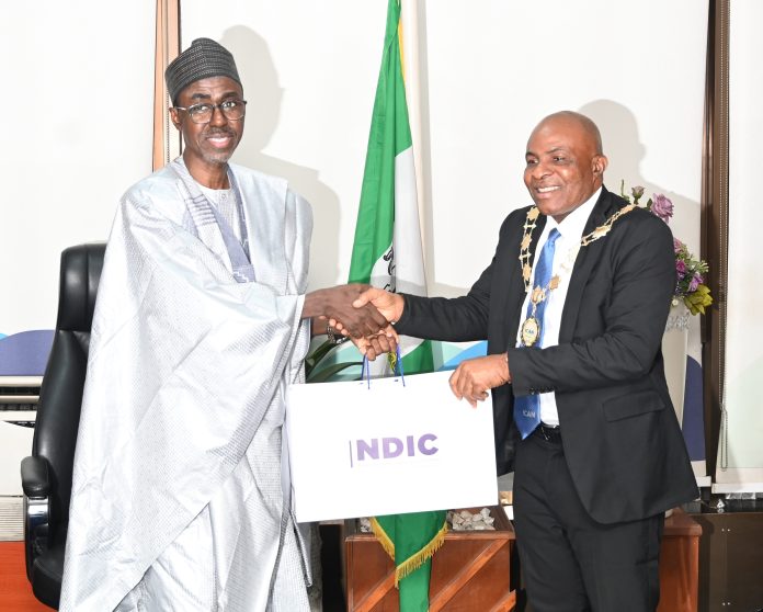 The MD/CE Nigeria Deposit Insurance Corporation (NDIC), Mr. Bello Hassan and the 60th President of the Institute of Chartered Accountants of Nigeria (ICAN), Chief Davidson Chizuoke S. Alaribe during the ICAN Governing Council members’ visit to the NDIC Management in Abuja.