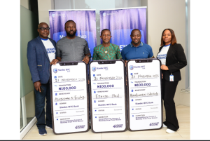 L-R: Bello Sheriff, Manager, Consumer Market and Youth Segment, Stanbic IBTC Bank; Asegiemhe Friday, winner; Ezeugo Paul, winner; Araoluwanimi Oderinlo, winner, represented by her father; and Marian Odidika, Manager, Customer Value Proposition, Stanbic IBTC Bank, during the Reward4Saving Promo 4.0 October cheque presentation ceremony held recently in Lagos.